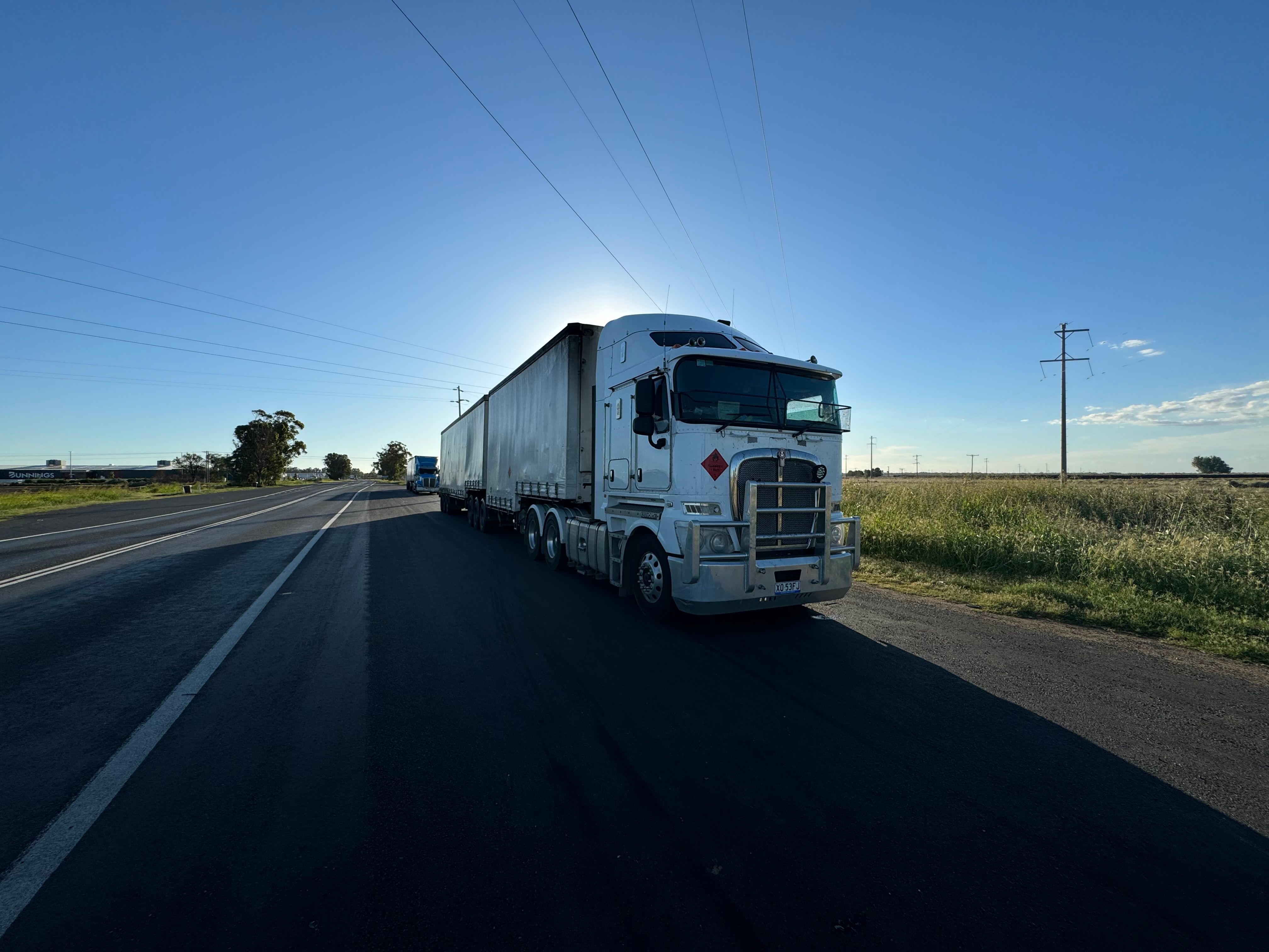 Truck operating a dedicated scheduled route on a recurring interstate lane